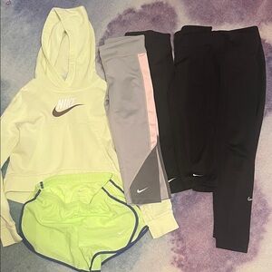 Girls Nike Lot- 3 capri Leggings, 1 regular leggings, sweatshirt and shorts.
